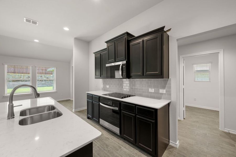 Representative exterior photo of a completed home built from the Alderbury II by Impression Homes in Mountain Valley, Burleson, TX (Image 8). Representative exterior photo of a completed home built from the Alderbury II by Impression Homes in Mountain Valley, Burleson, TX (Image 8).