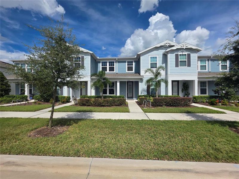 Front exterior of a new home in , Orlando, FL, highlighting curb appeal (Image 2).