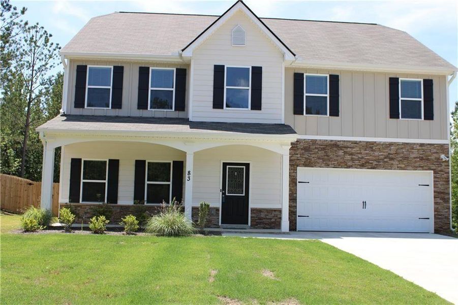 Front exterior of a new home in , Dallas, GA, highlighting curb appeal (Image 25). Front exterior of a new home in , Dallas, GA, highlighting curb appeal (Image 25).