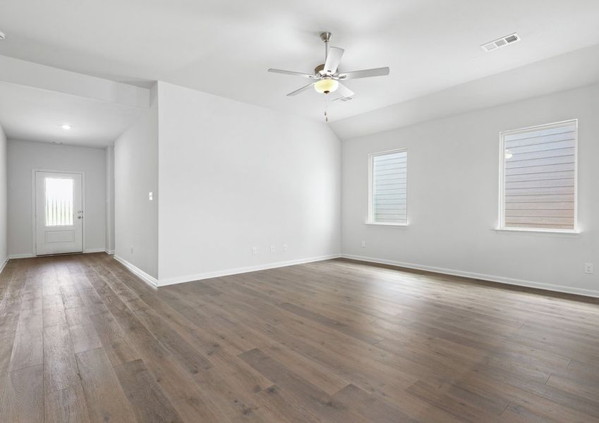 The family room of the Reed is spacious and has large windows. The family room of the Reed is spacious and has large windows.