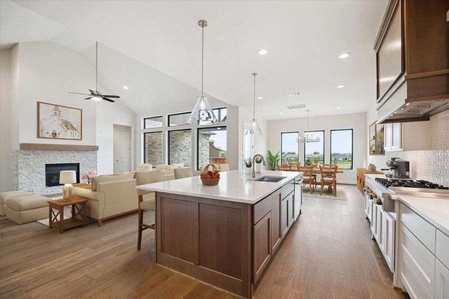 View of the Kitchen, Living, and Dining Area (with virtually staging). View of the Kitchen, Living, and Dining Area (with virtually staging).