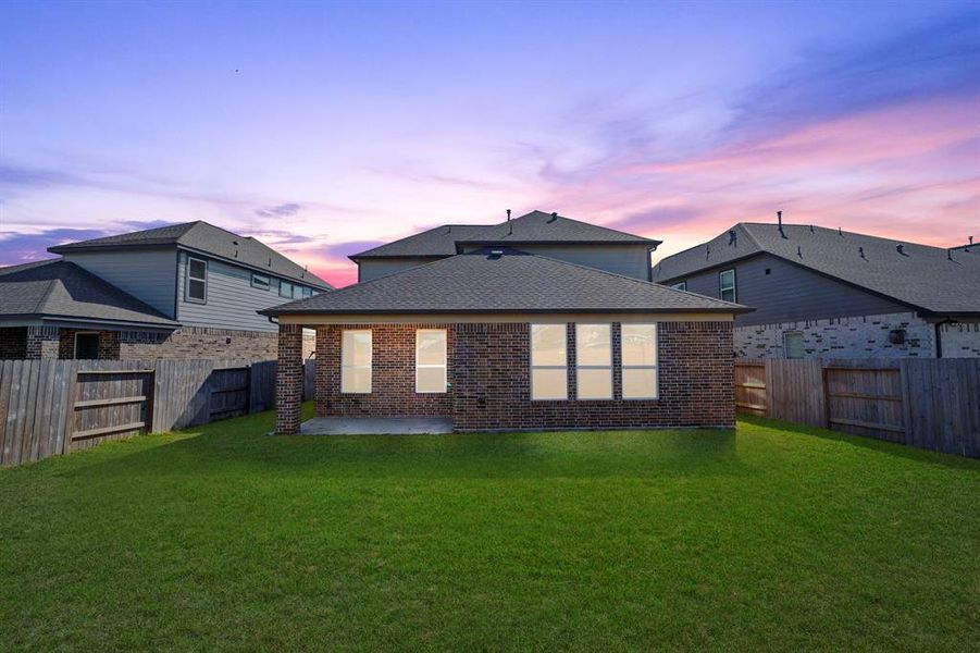 Step into your spacious backyard perfect for any outside activities