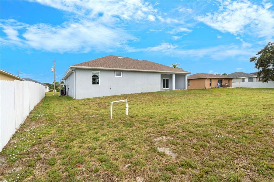 Exterior details and patio area of a home in , Lehigh Acres (Image 4).