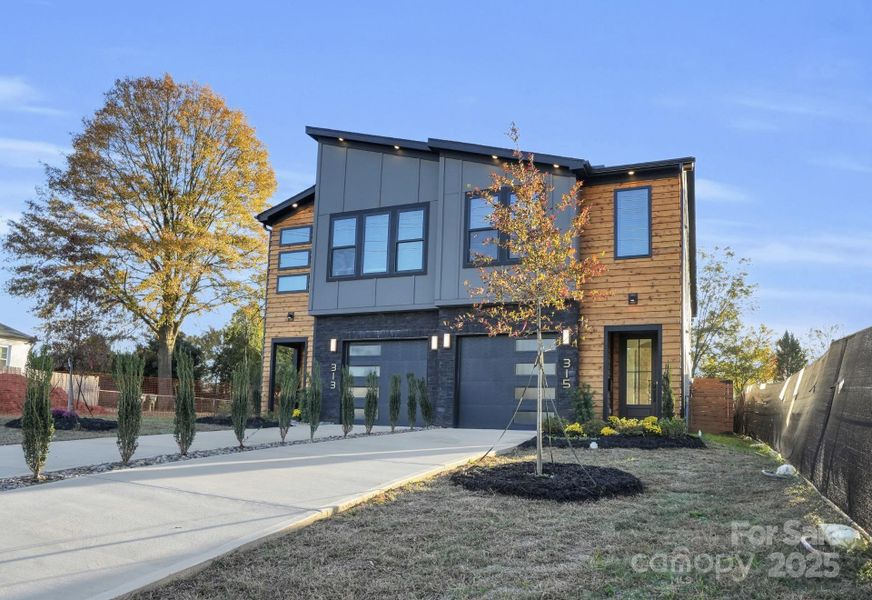 Front exterior of a new home in , Charlotte, NC, highlighting curb appeal (Image 2).