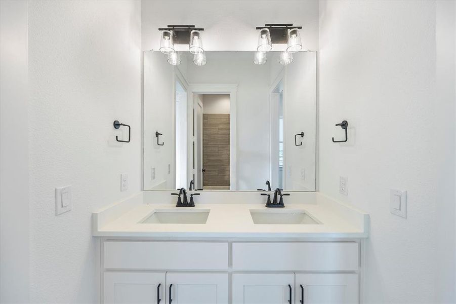 Full bathroom with double vanity Full bathroom with double vanity