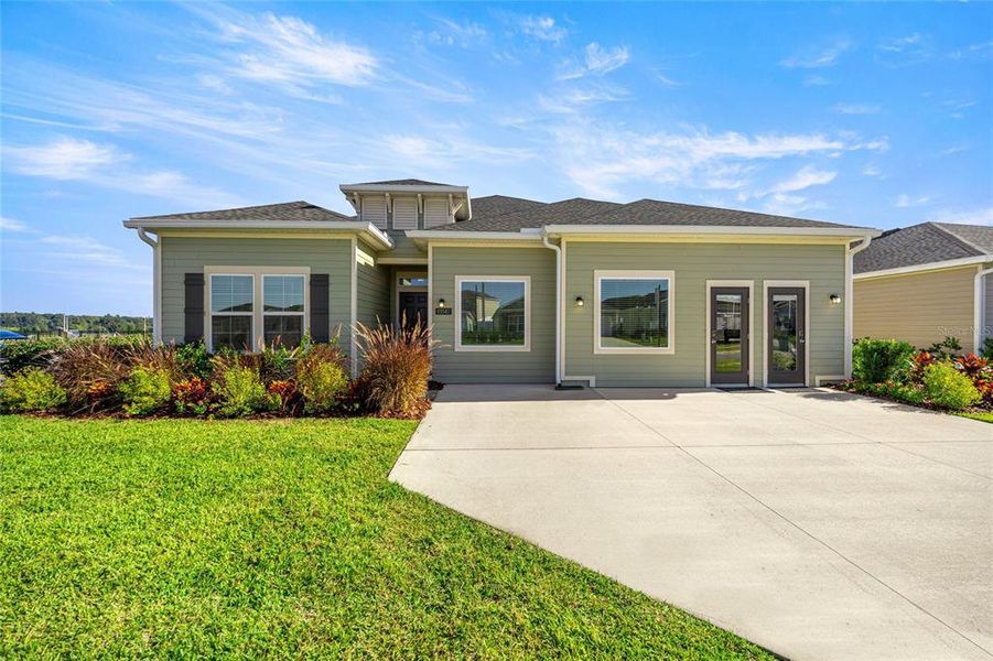 Exterior details and patio area of a home in Trailhead Landing: Trailhead Landing 60s, Alachua (Image 20).