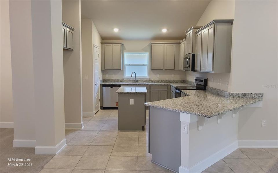 Furnished interior view inside a new home in Harmony Central, St. Cloud (Image 4).