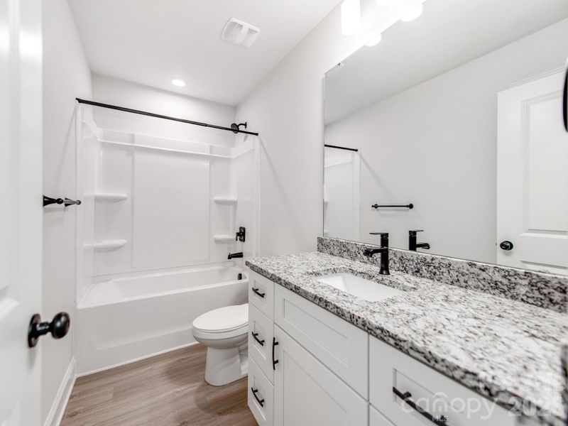 Furnished interior view inside a new home in , Monroe (Image 11).