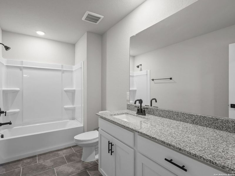 Furnished interior view inside a new home in Comanche Ridge, San Antonio (Image 17).