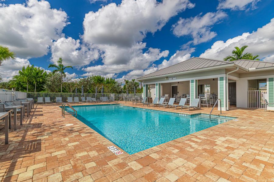 Exterior details and patio area of a home in Windsong Estates, Lake Worth (Image 4).