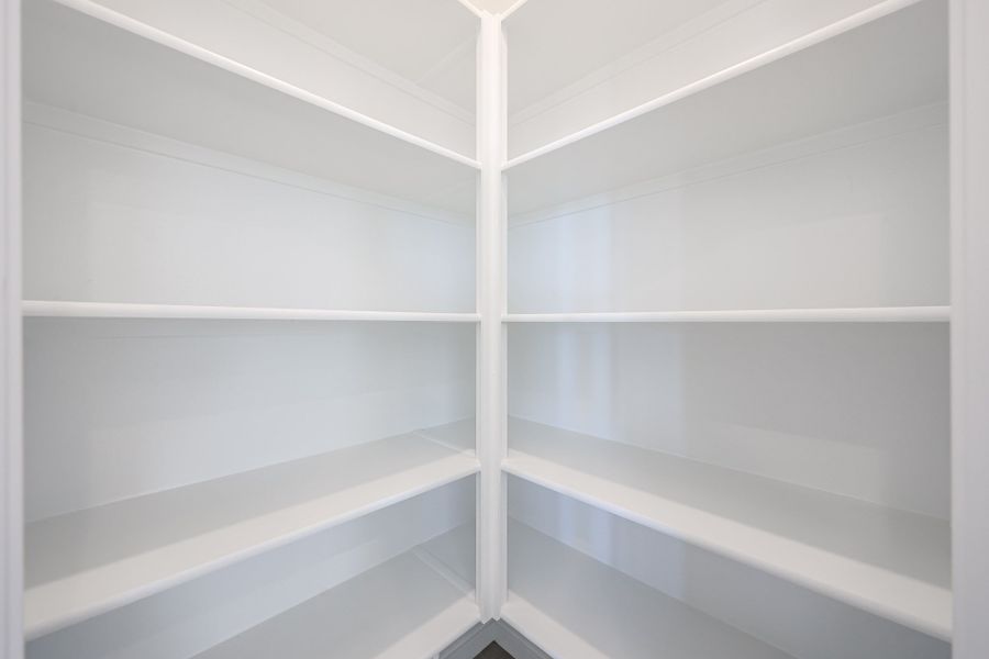 A white ceiling with white beams. A white ceiling with white beams.