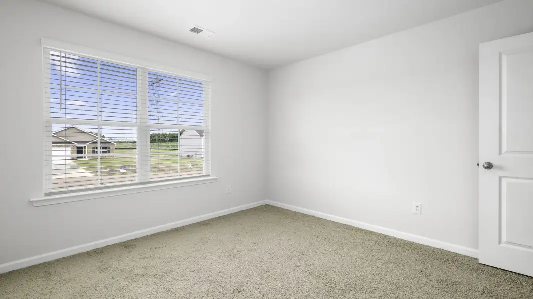 Spacious, unfurnished interior of a new home in Neal Place, Stokesdale (Image 17).