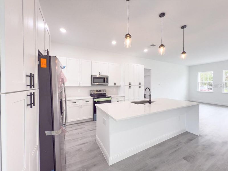 Furnished interior view inside a new home in , Ocala (Image 8).