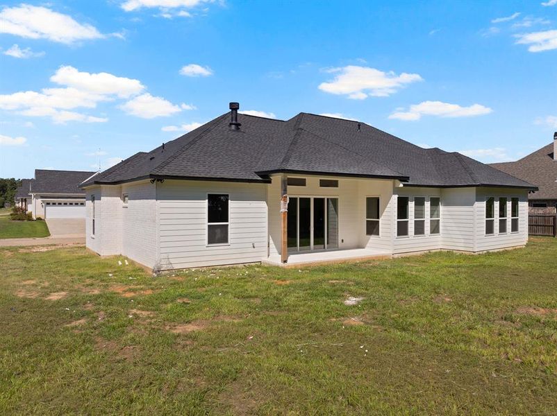 Front exterior of a new home in , Mount Pleasant, TX, highlighting curb appeal (Image 27). Front exterior of a new home in , Mount Pleasant, TX, highlighting curb appeal (Image 27).