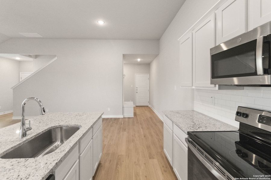 Furnished interior view inside a new home in Emma Park, Buda (Image 11). Furnished interior view inside a new home in Emma Park, Buda (Image 11).