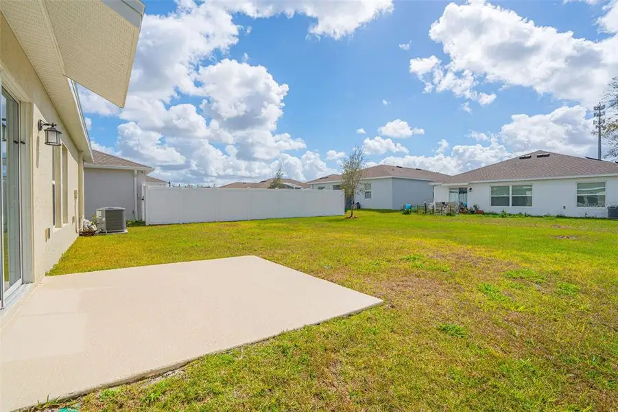 Exterior details and patio area of a home in Vineland Reserve, Osteen (Image 26).