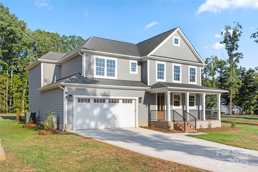Front exterior of a new home in , Maiden, NC, highlighting curb appeal (Image 1). Front exterior of a new home in , Maiden, NC, highlighting curb appeal (Image 1).