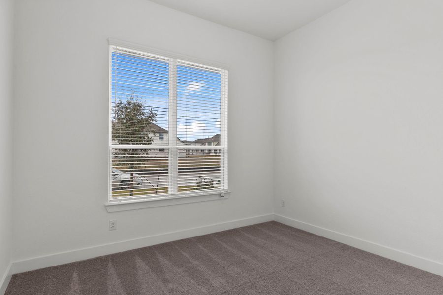 Spacious, unfurnished interior of a new home in Blue Heron, Mont Belvieu (Image 15).