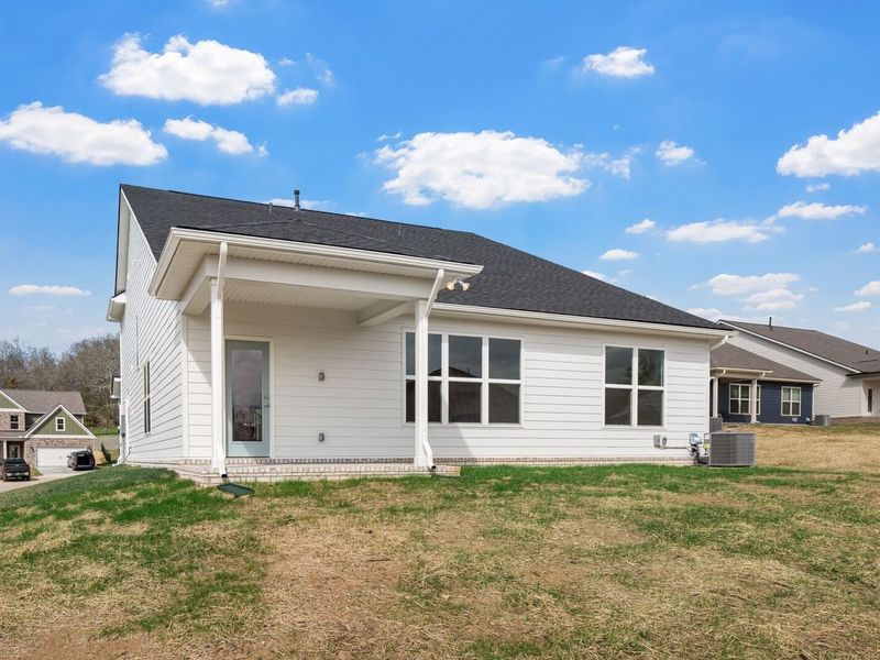 Exterior details and patio area of a home in Woods Crossing, Gallatin (Image 32).