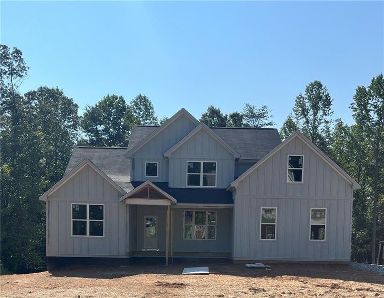 Front exterior of a new home in , Dawsonville, GA, highlighting curb appeal (Image 1).