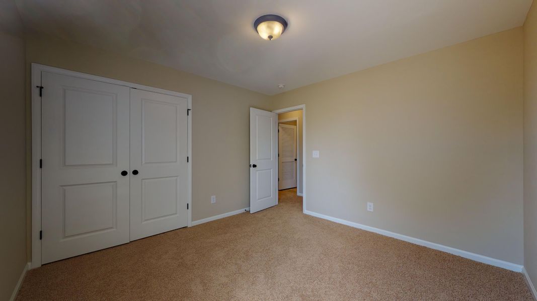 Representative unfurnished interior of a home built from the Rockbridge by Bill Clark Homes in Davenport Farms, Winterville (Image 44).