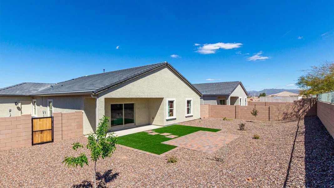 Front exterior of a new home in Saguaro Bloom, Marana, AZ, highlighting curb appeal (Image 20). Front exterior of a new home in Saguaro Bloom, Marana, AZ, highlighting curb appeal (Image 20).