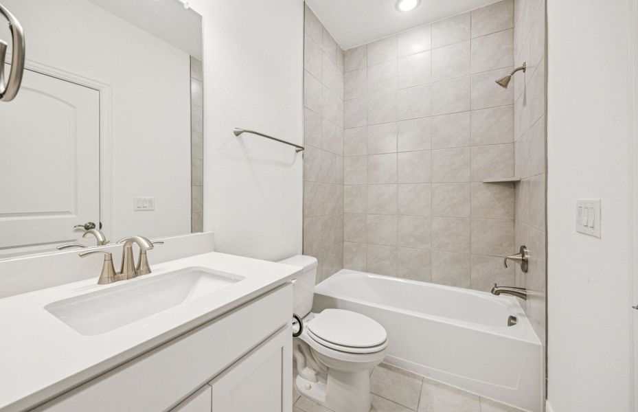 Spacious secondary bathroom*real home pictured