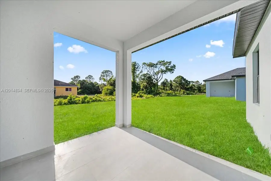Exterior details and patio area of a home in , Lehigh Acres (Image 4).