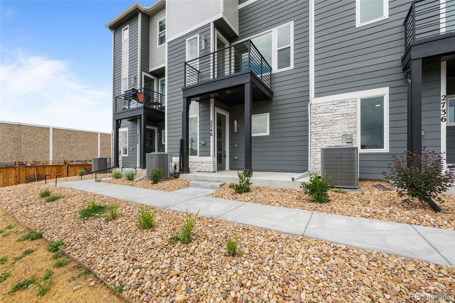 Front exterior of a new home in , Denver, CO, highlighting curb appeal (Image 12).