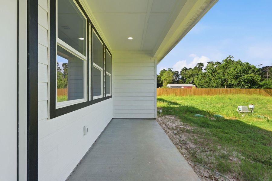 Exterior details and patio area of a home in , Conroe (Image 23). Exterior details and patio area of a home in , Conroe (Image 23).