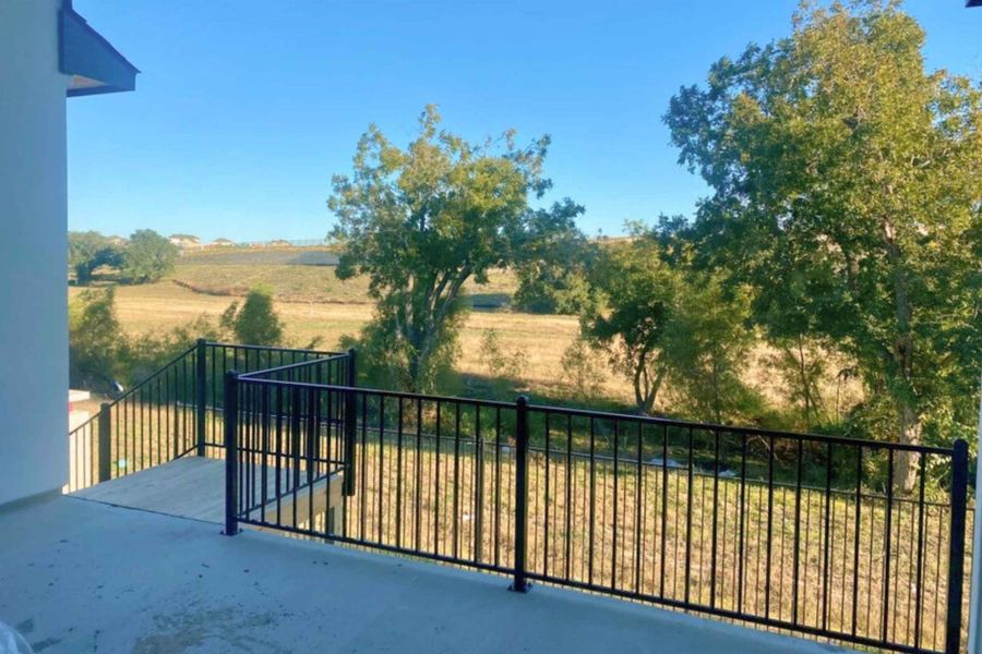 Balcony with a view of rural / pastoral area