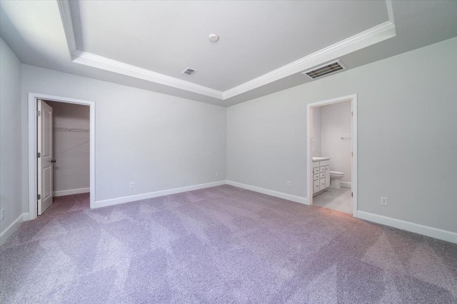 Retreat to the owner's suite with tray ceiling. Retreat to the owner's suite with tray ceiling.