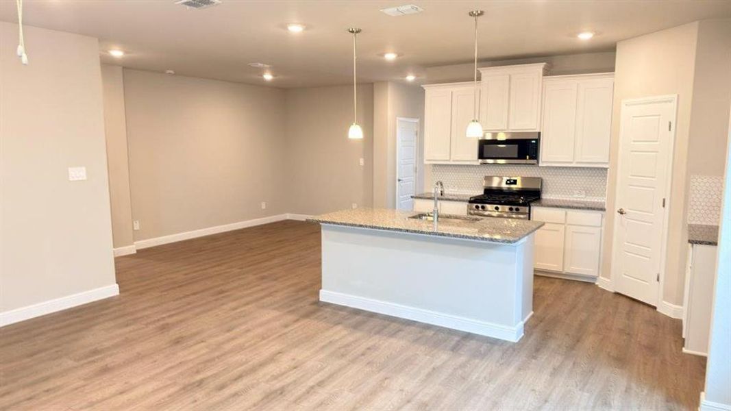 Furnished interior view inside a new home in Bluestem, Rhome (Image 8).