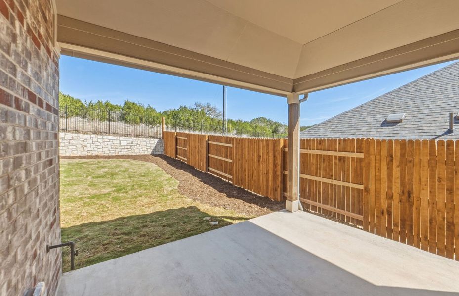 Exterior details and patio area of a home in West Cypress Hills, Spicewood (Image 29). Exterior details and patio area of a home in West Cypress Hills, Spicewood (Image 29).