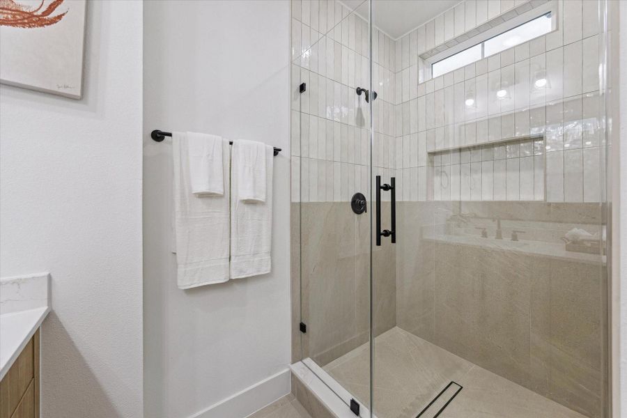 Walk-in shower with contemporary tile design Walk-in shower with contemporary tile design