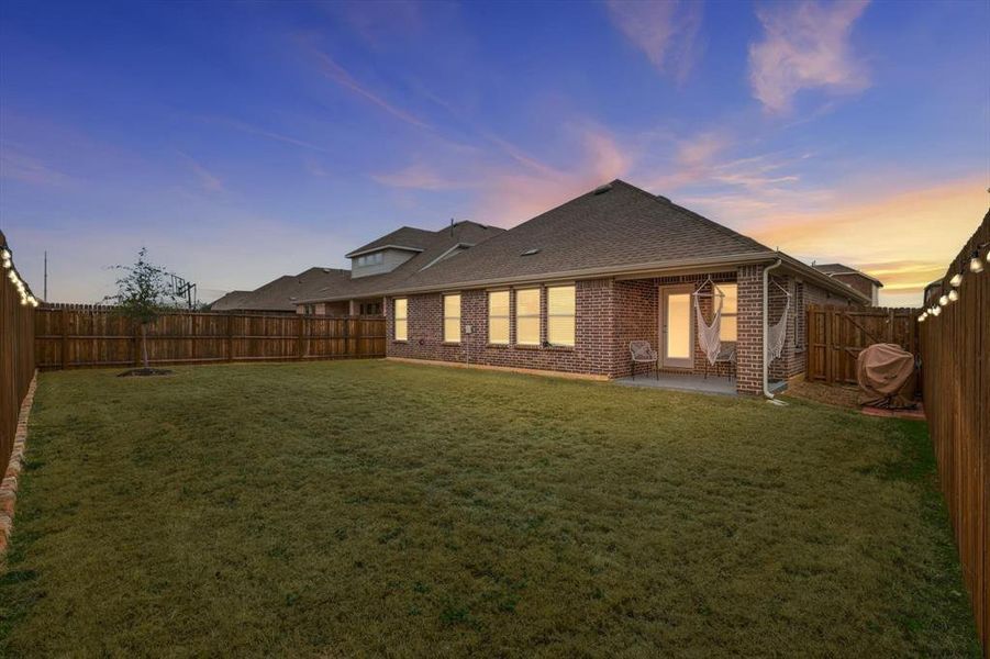 Exterior details and patio area of a home in , Aubrey (Image 3).