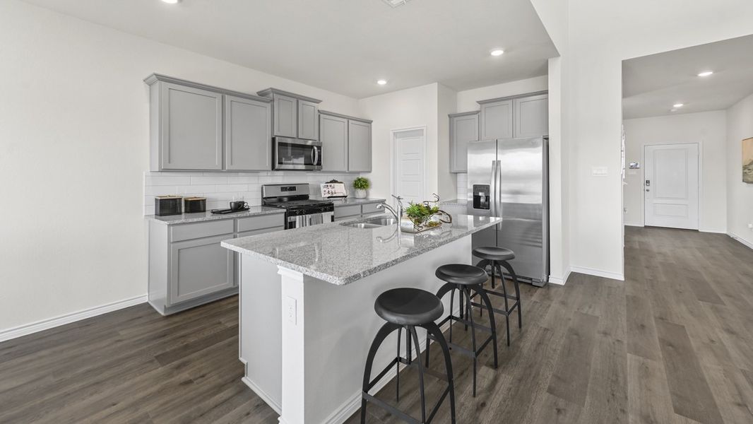 Representative furnished interior of a home built from the Tangerine by D.R. Horton in Silverado, Aubrey (Image 4).