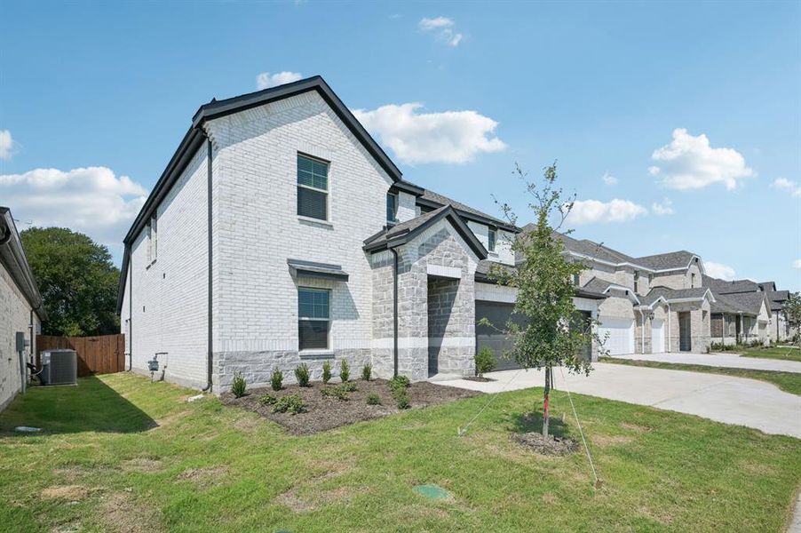 Front exterior of a new home in Windmore, Princeton, TX, highlighting curb appeal (Image 1).