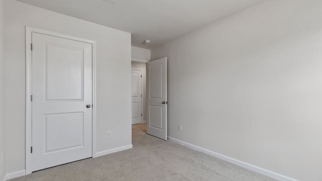 Spacious, unfurnished interior of a new home in The Townes at Wilson's Ridge, Smithfield (Image 23).