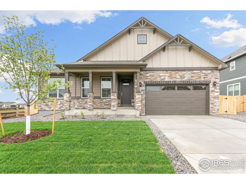 Front exterior of a new home in Vantage, Berthoud, CO, highlighting curb appeal (Image 2).