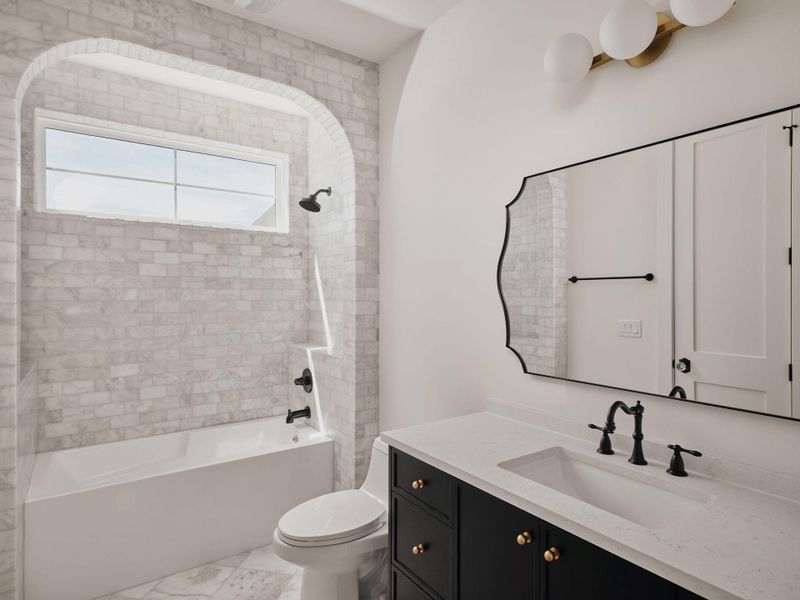 Bathroom with vanity and  shower combination