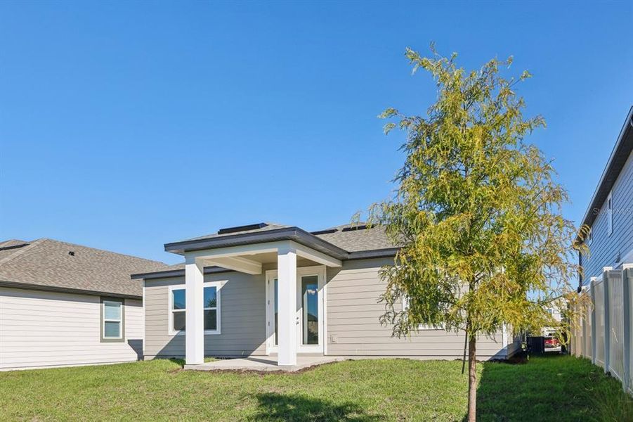 Exterior details and patio area of a home in Ellington Traditional, St. Cloud (Image 18). Exterior details and patio area of a home in Ellington Traditional, St. Cloud (Image 18).