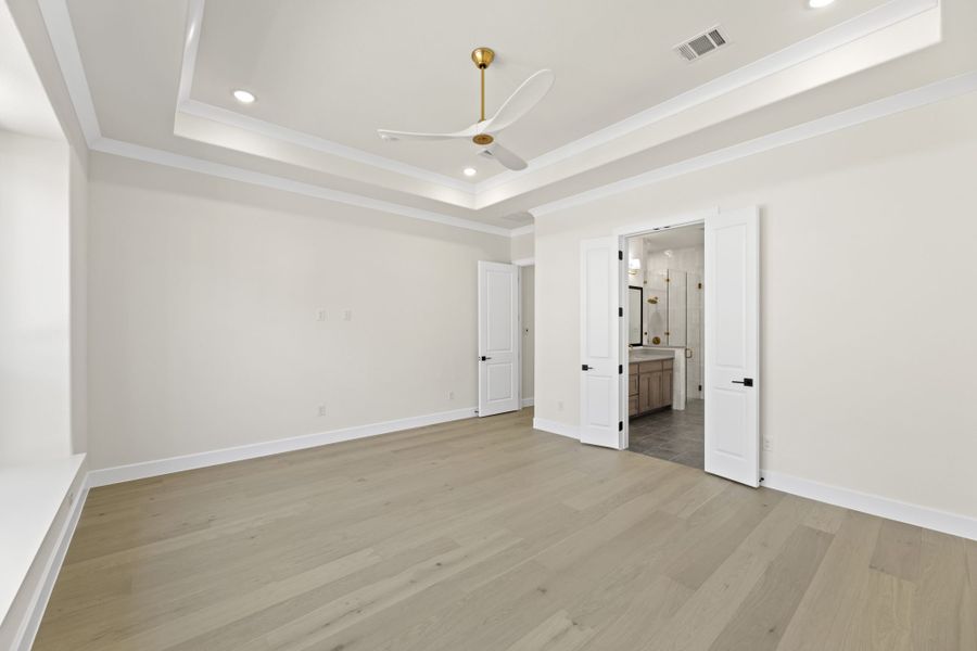 Representative unfurnished interior of a home built from the 5551 by Tradition Homes in Windsong Ranch, Prosper (Image 27).