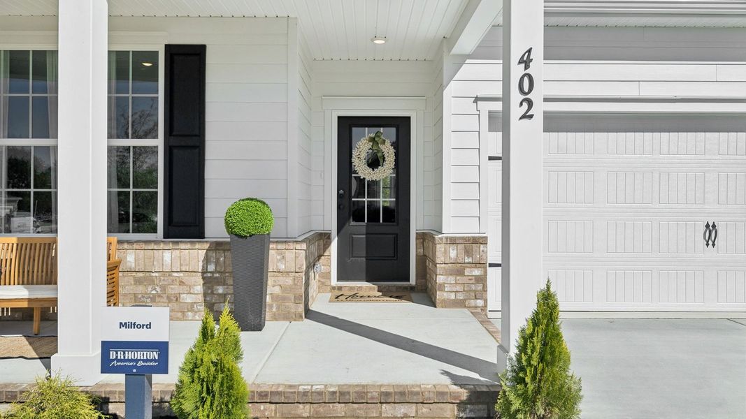 Representative exterior details of a home built from the MILFORD A by D.R. Horton in Reserve at Hickory Ridge, Columbia (Image 3). Representative exterior details of a home built from the MILFORD A by D.R. Horton in Reserve at Hickory Ridge, Columbia (Image 3).