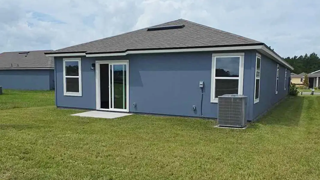 Exterior details and patio area of a home in The Arbors, Jacksonville (Image 4). Exterior details and patio area of a home in The Arbors, Jacksonville (Image 4).