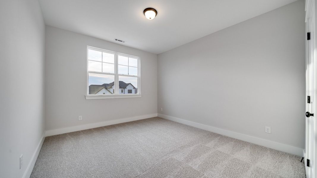 Furnished interior view inside a new home in Richvale Estates, Fairview (Image 33).