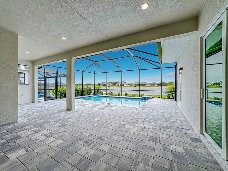 Exterior details and patio area of a home in River Preserve Estates, Parrish (Image 3).