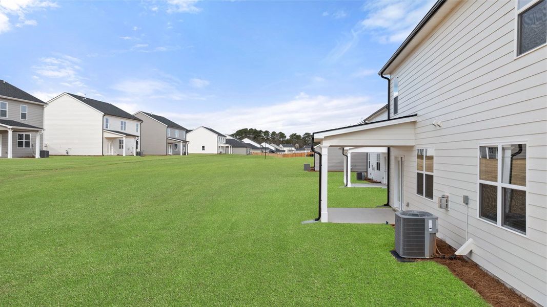 Front exterior of a new home in Estates at Deer Hollow, Grovetown, GA, highlighting curb appeal (Image 27).