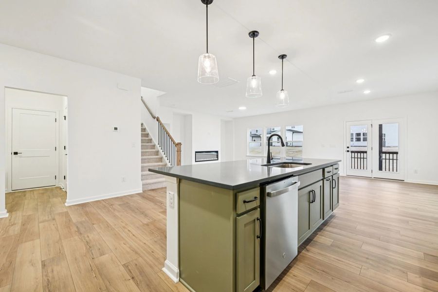 Kitchen featuring the AW Collection® Rosemary - Matte black, light wood, and garden-inspired style.