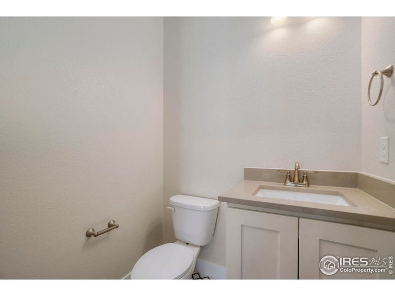 Main floor powder bath with vanity!